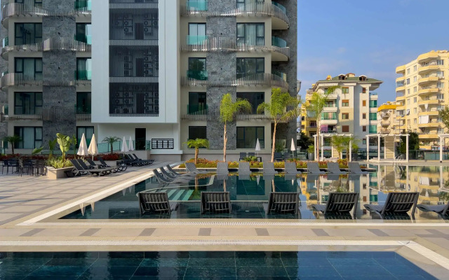Qoople Excellence B49 v 100 m Apartments