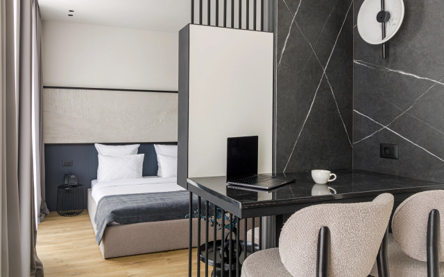 V chetirehzvezdochnom otele Blanc Hill Apartment