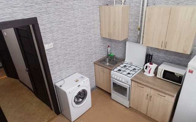 V Tsentre Goroda Apartments