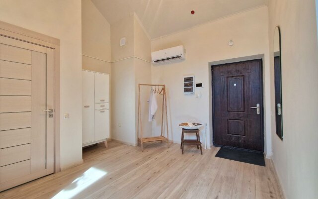 Квартира Просторная двухуровневая студия у подножия Казанского Кремля