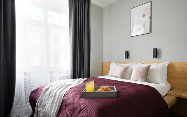 Апартаменты Уютная студия в центре 1