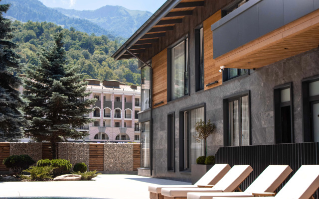 V chetirehzvezdochnom otele Blanc Hill Apartment