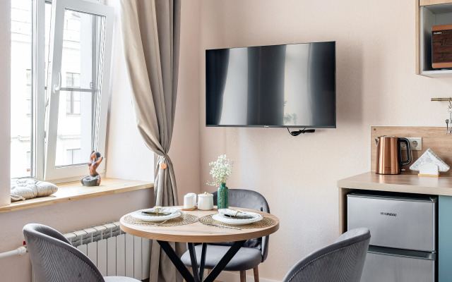 Квартира Яркая студия рядом с Невским Проспектом