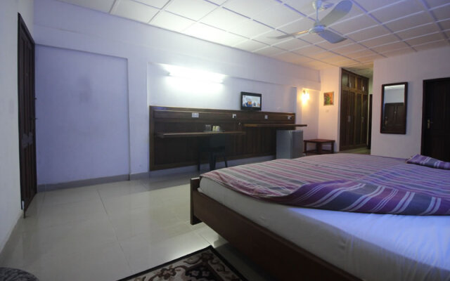 Whispering Palms Hotel and Resort