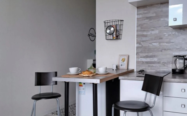 Апартаменты Wing Tower - высотная студия в центре