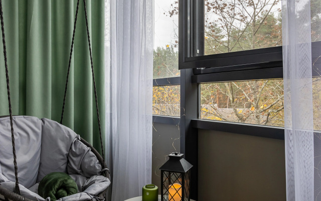 Квартира Ютно Колосья с качелью на балконе и видом на сосны в Зеленогорске