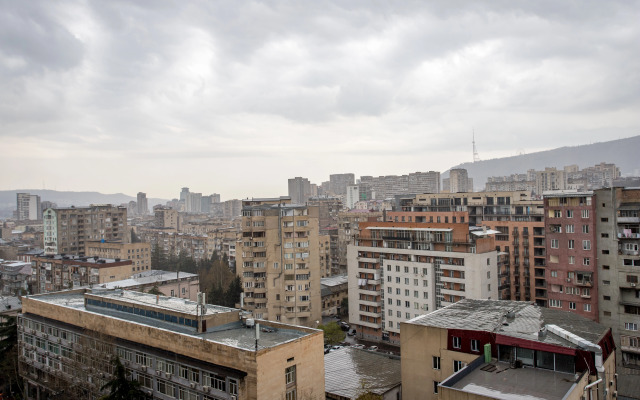 Apartments with a View of the Ferris Wheel and the City