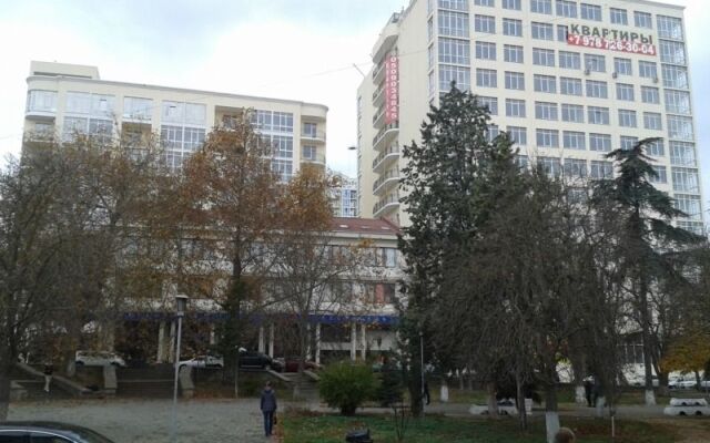V Tsentre Goroda Apartments