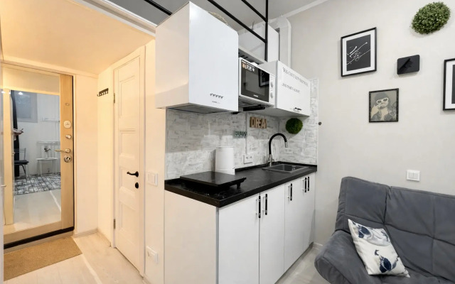 Апартаменты Garden City двухуровневая студия на цокольном этаже