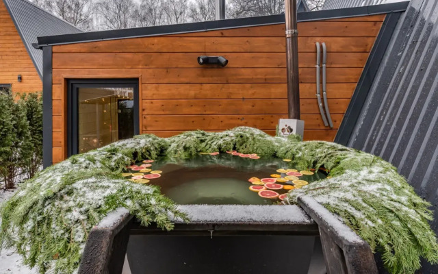 Частный дом Увеличенный А-фрейм Сад с баней и чаном