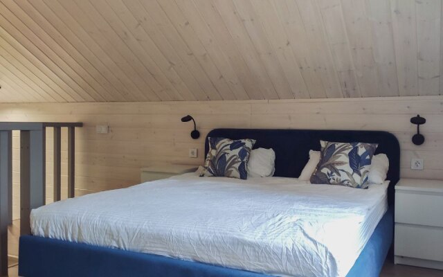 Dom V Lesu Guest house