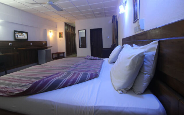 Whispering Palms Hotel and Resort