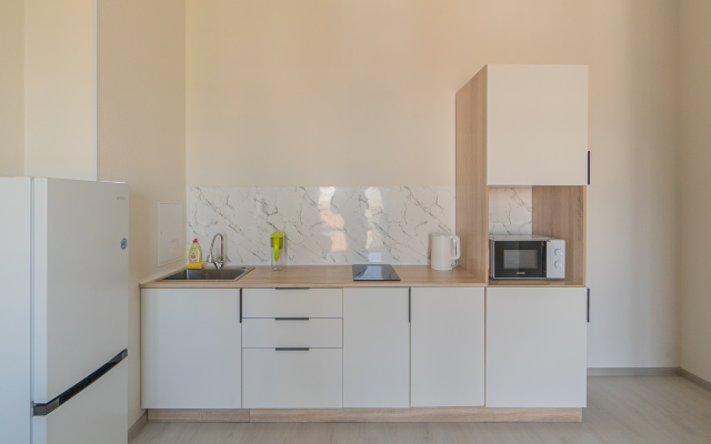 Апартаменты Двухкомнатная Квартира на Мансардном Этаже