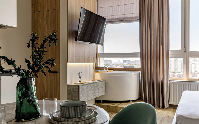 Апартаменты VIP студия с роскошной ванной у панорамного окна