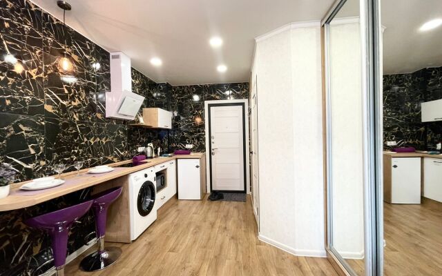 V Tsentre Goroda Apartments