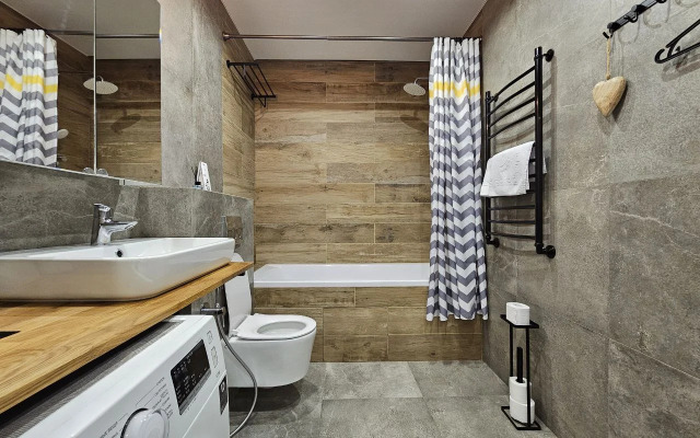 Квартира лофт над елями