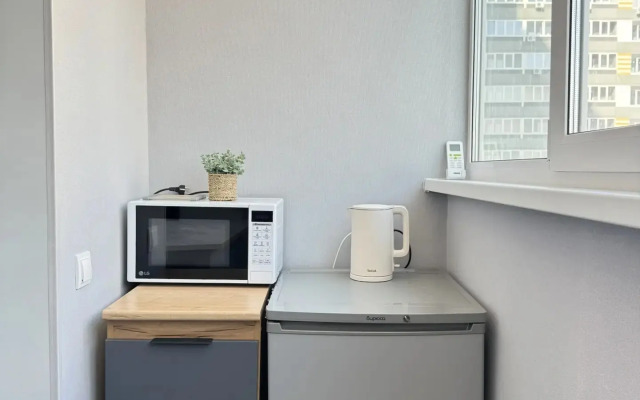 Апартаменты Уютная студия в развитом районе города