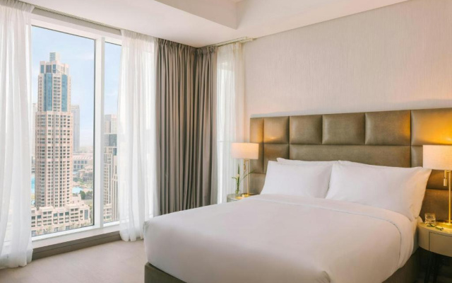 Отель Aura Suites Downtown