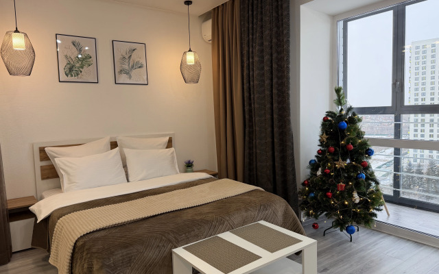 Квартира Просторная студия с панорамным видом из окна