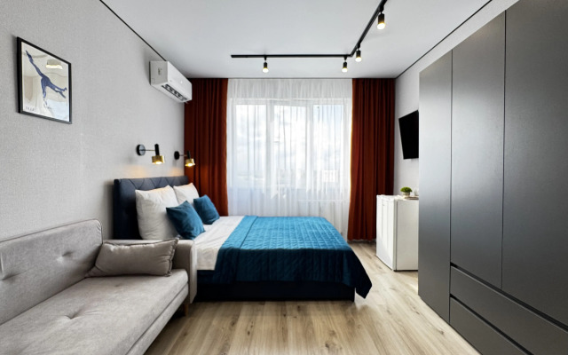 Апартаменты Уютные в Развитом Районе Города