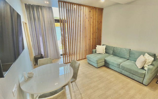 Apartament Green v Rezidentsii Baykalskiye Kholmy