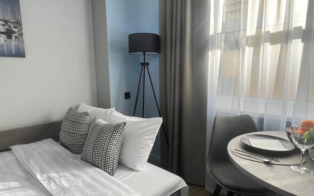 U Chasovoy Bashni Golubye Apartments