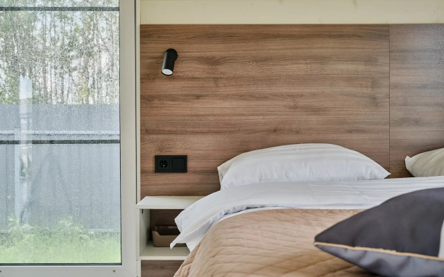 Частный дом с сауной, детской и спортивной площадкой