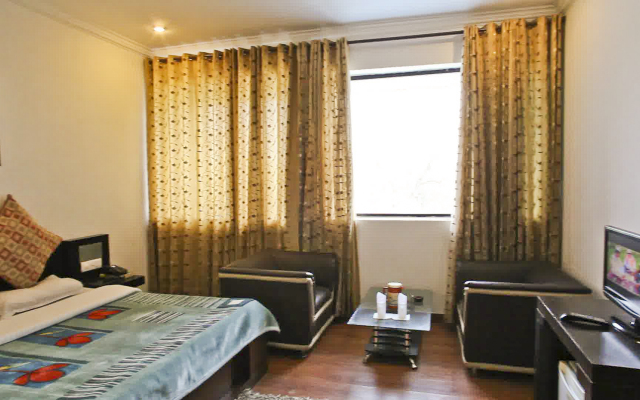 Uttam by Sky Stays Hotel