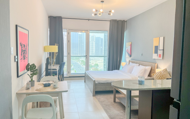 Cosmos Living Spacious Studio With Balcony Apartments
