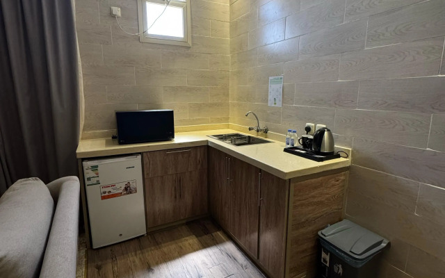 Al-Ufq Suites Hotel