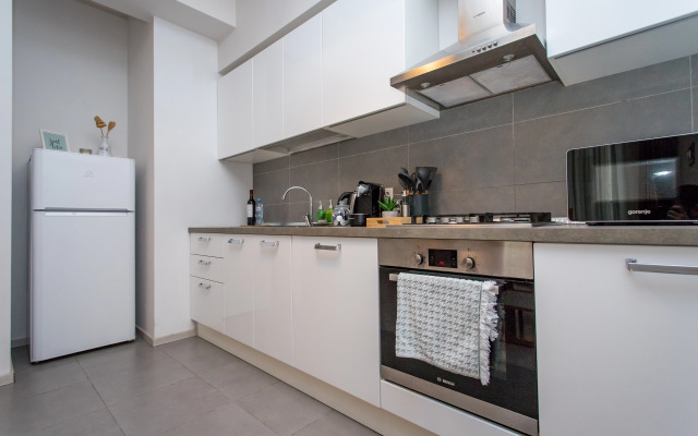 Apartments with a View of the Ferris Wheel and the City