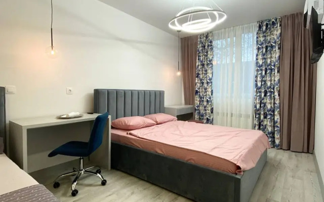 Апартаменты двухкомнатные с двумя кроватями, гардеробной и кухней-гостиной