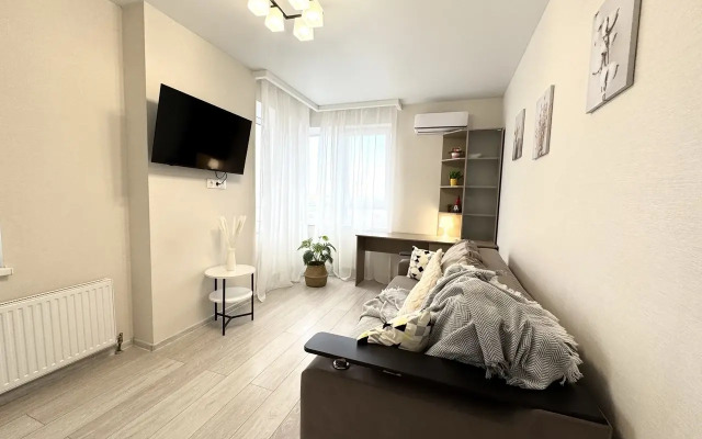 Апартаменты на Ларина 45 строение 1