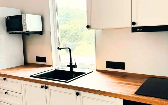 Частный дом с бассейном и баней