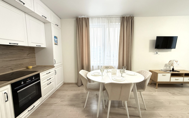 Апартаменты Элитные на берегу реки Тура с видом на Мост Влюбленных