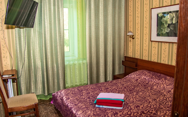 Четырёхместный номер Comfort с 2 комнатами с видом на город — фото 2
