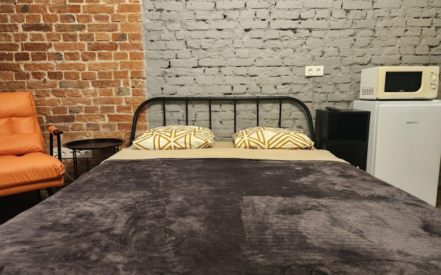 Квартира cтудия в стиле лофт в историческом здании