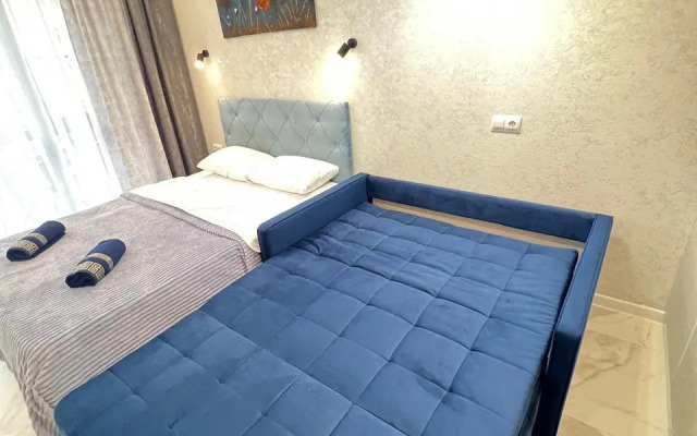 Studiya s balkonom Apartments