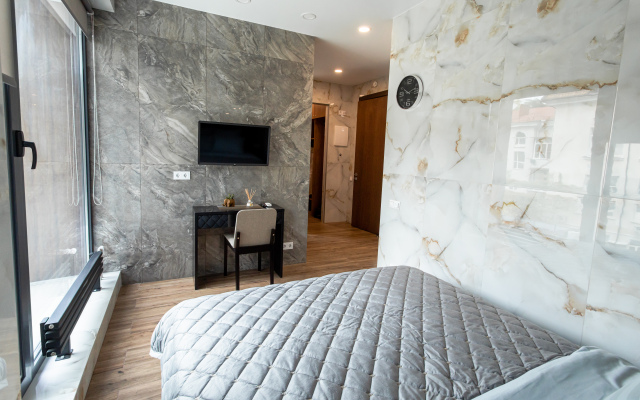 V centre Sochi 10 minut do morya AK Arhitektor chetirehmestnie komfort Apartaments