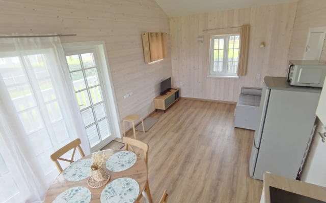V Snetkovo U Ozera Private House