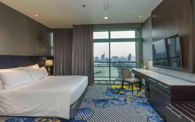 Отель Chatrium Riverside Bangkok