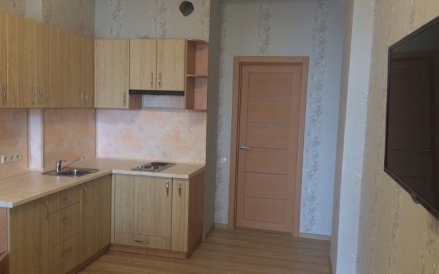 V Tsentre Goroda Apartments