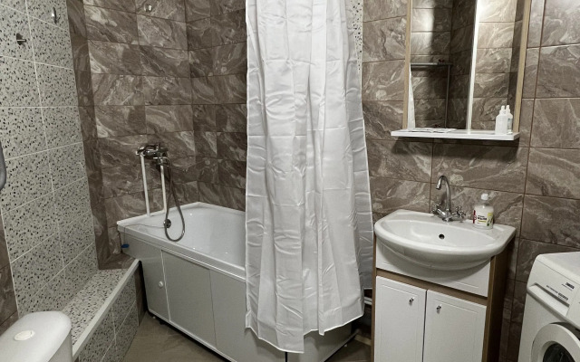 Na Naberezhnoy 122/4 Apartments