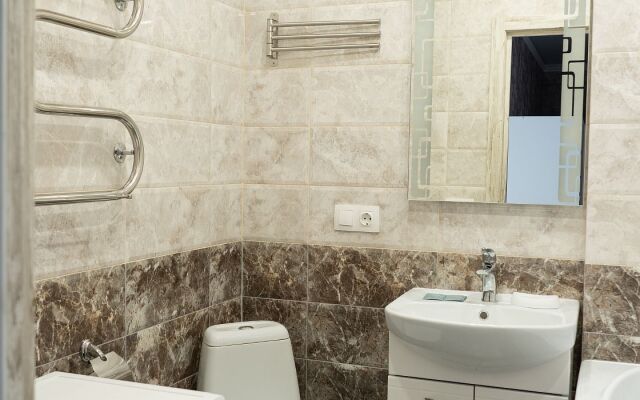 Studiya lyuks na Pukhova 56 Apartments