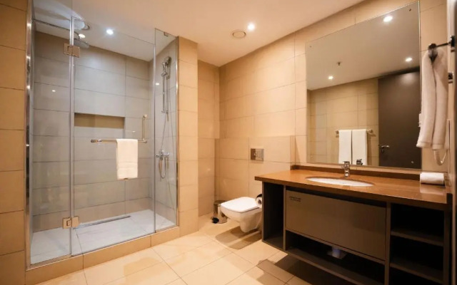 Отель Trademark Suites at Enaki Town