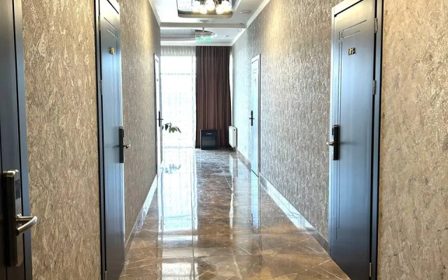 Отель  Милос