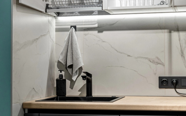 Uyutnaya s dizaneynerskim remontom v tsentre goroda Flat