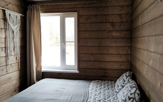 Частный дом Чёрный домик у озера Отрадное