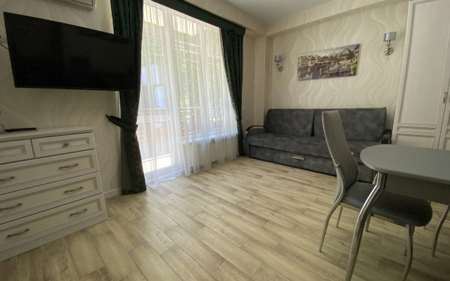 V Samom Tsentre Kurorta Apartment