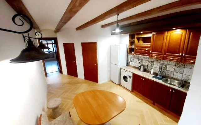 V Tsentre Goroda Apartments
